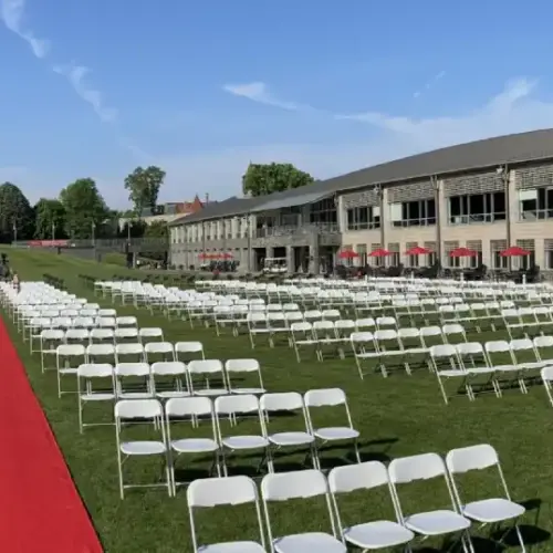 Haber Green set up for graduation with chairs and a red carpet before guests arrive