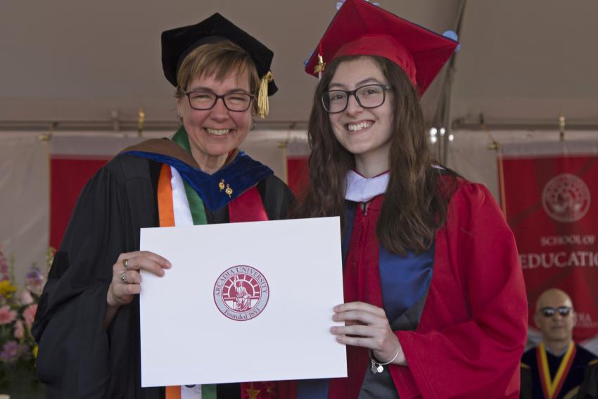 A student from class of 2017 graduating.