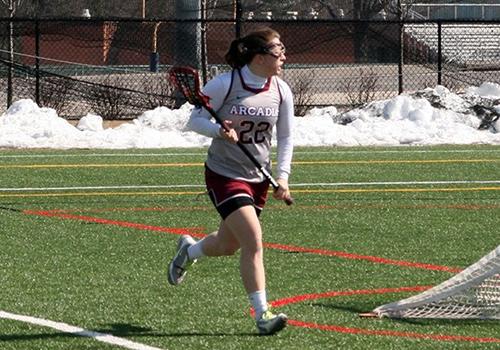 A woman lacrosse player.