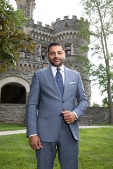 Ajay Nair, Ph.D. President Arcadia University stands in front of Grey Towers