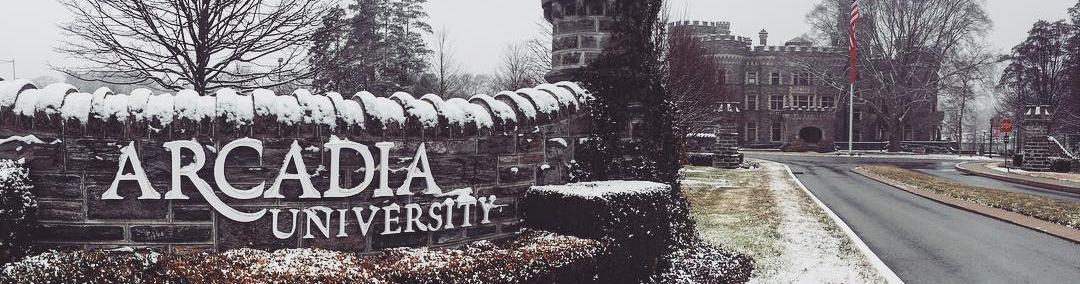 Arcadia University entrance gate in the snow