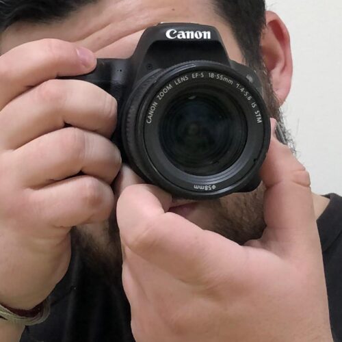 A person holding a camera