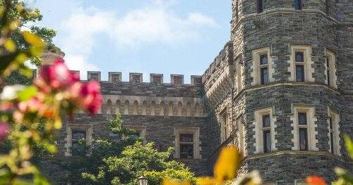 Windows of Grey Towers Castle with flowers surrounding the frame