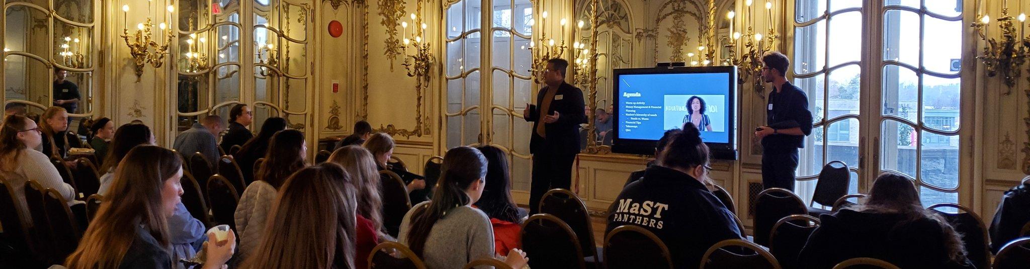 A presentation on financial aid in the Mirror Room