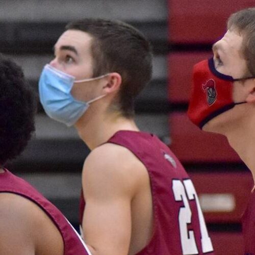 Men's Volleyball players return to the court wearing masks after COVID-19 shutdowns halted athletic events around the world