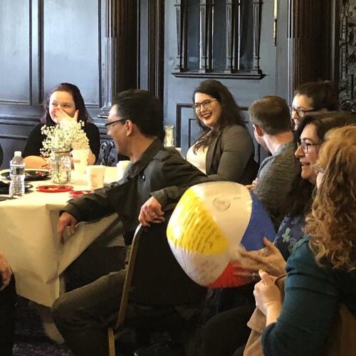 A look at the "Small School Experience" with people sitting around tables in Grey Towers Castles