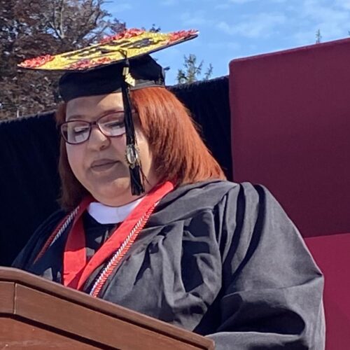 A woman giving a graduation speech