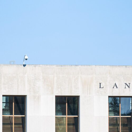 Front view of Landman Library building with windows and title