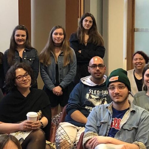 A group photo of students and faculty.