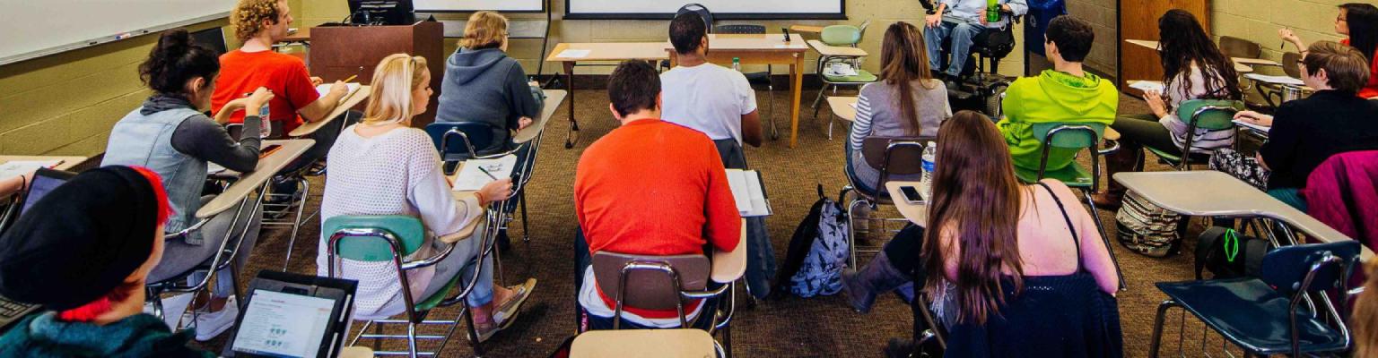 Students sitting in desks in a classroom