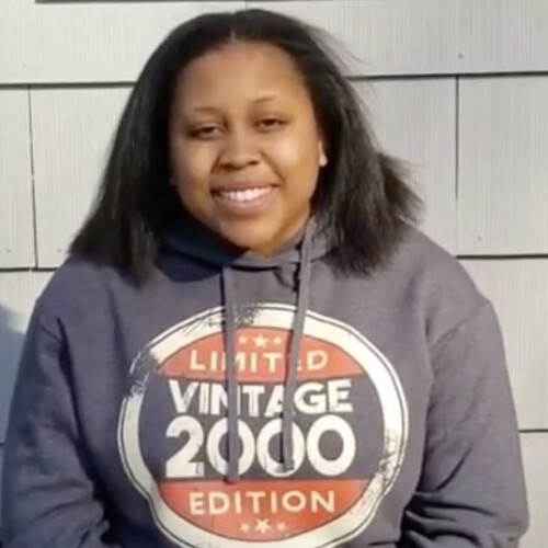 Daijah Patton wearing a Limited Vintage 2000 Edition Hoodie