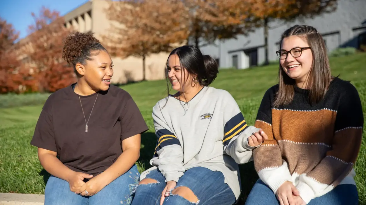 Students enjoy a Special Admission Program outside on campus.