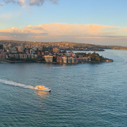 View above bridge in Sydney Australia with boats in water