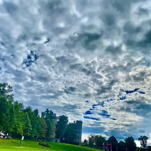 Midday view of the sky across Haber Green from Landman Library.