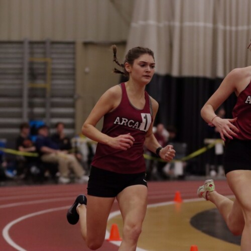 Micah Gordley partakes in an indoor track meet