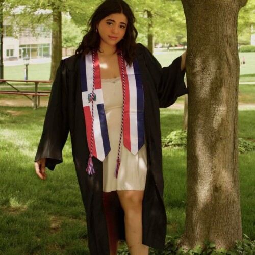 Lisa Maria DiSalvo '23 dressed in a graduation robe