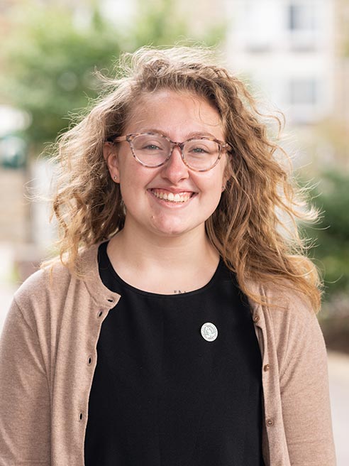 Hannah Craig smiles in a headshot.