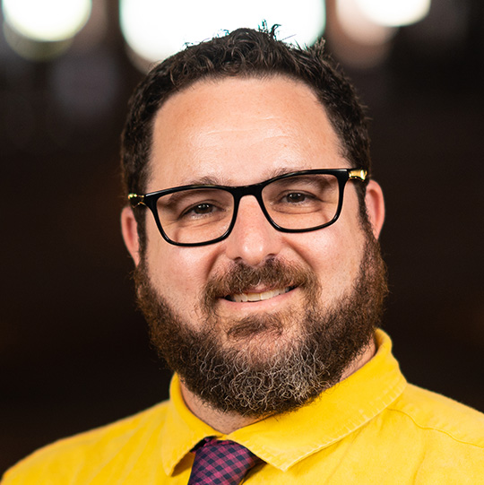 A headshot of Adam Levy, a psychology professor at Arcadia University