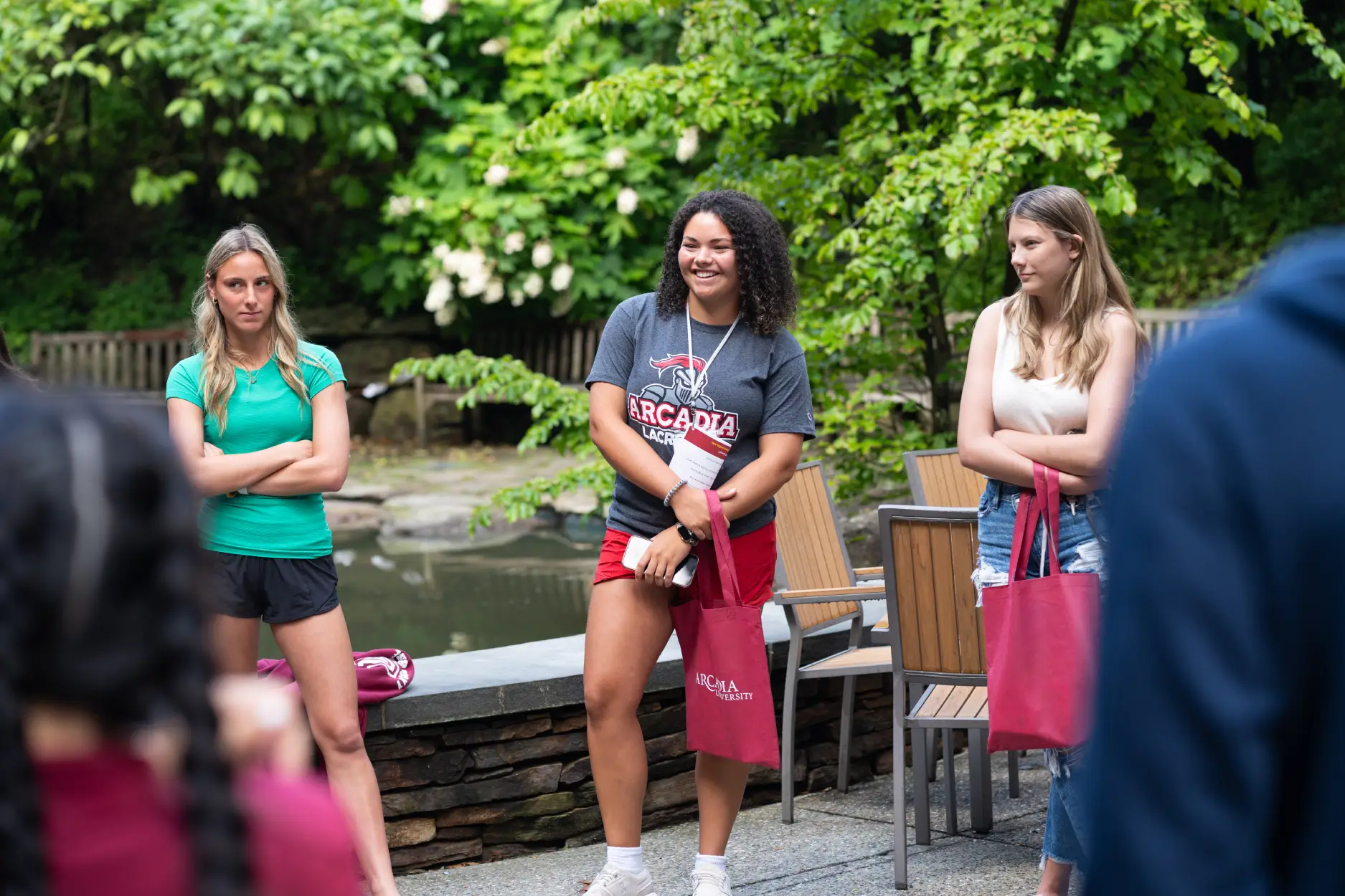 Students cheering in a group during orientation