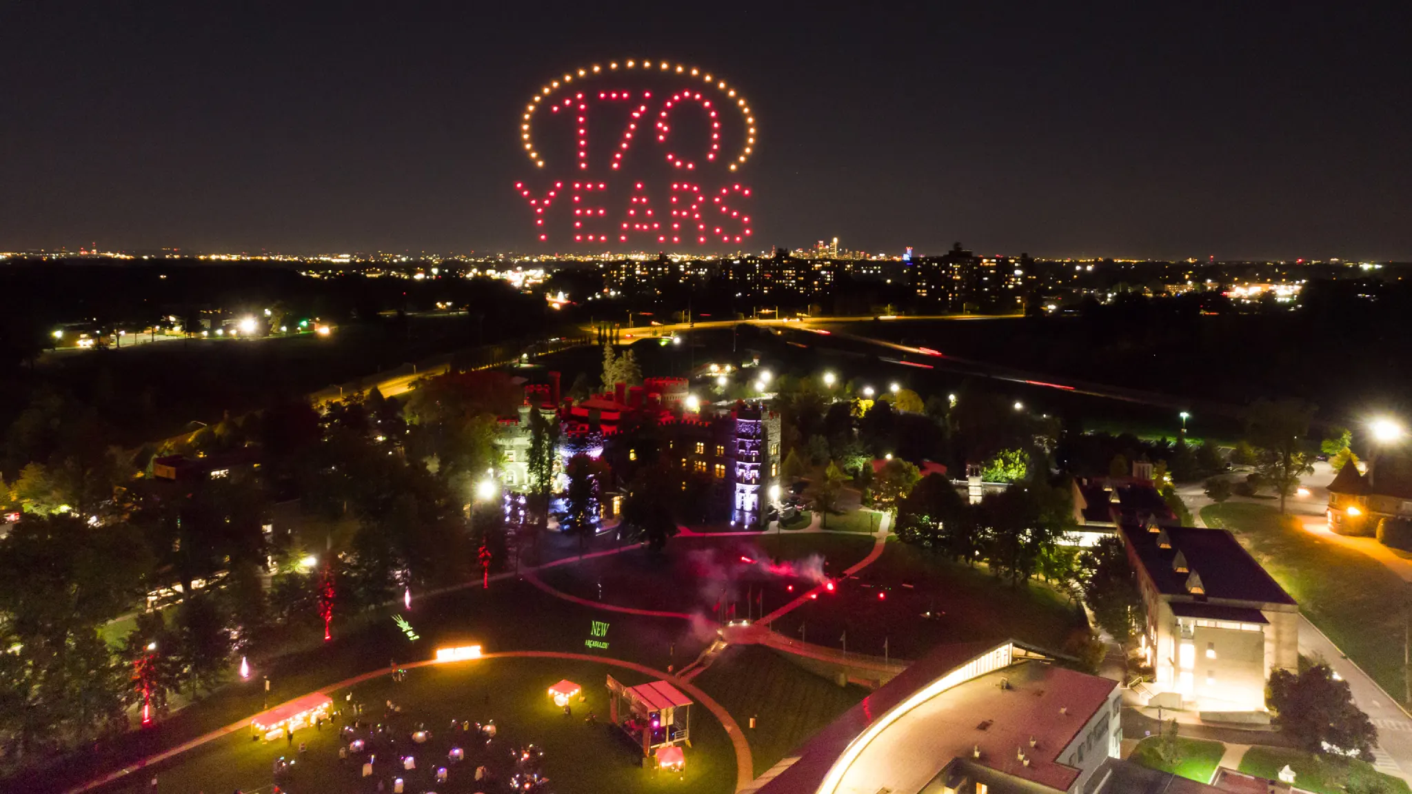 A lightshow saying, 170 Years, lights up the night sky around Arcadia.