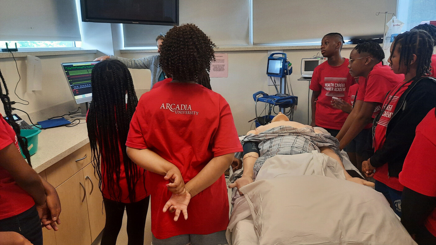 Visiting secondary students take a look at the College of Health Sciences teaching areas and labs.