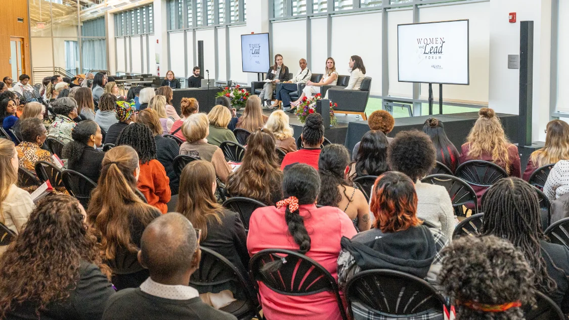 A crowd listens to speakers during the Women Who Lead Forum 2024 at Arcadia University.