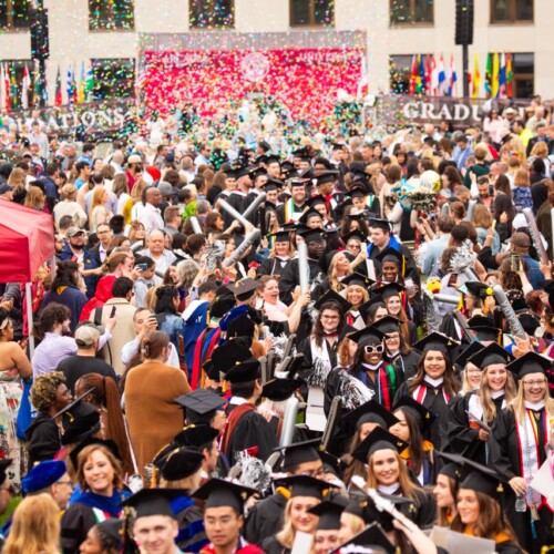 Students celebrating at commencement.