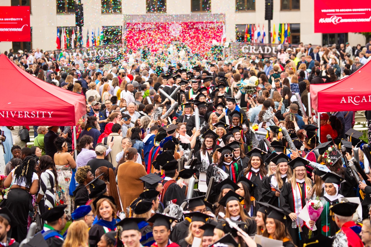 Students celebrating at commencement.