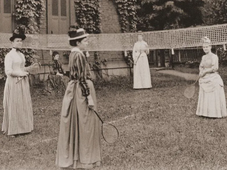 Beaver College guests play tennis in long skirts in the late 1880