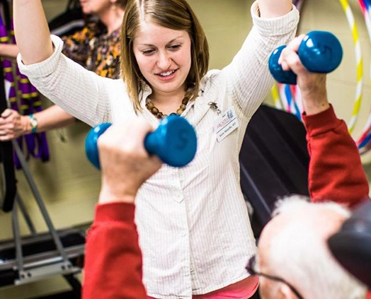 An instructor and patient in the Physical Therapy Stay Fit Program