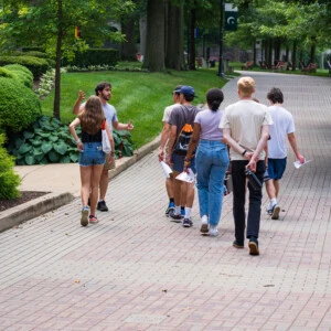 Students taking a tour of Arcadia's campus.