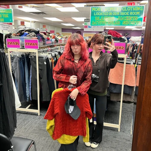 Zara Peters and her friend in the New Life thrift store.